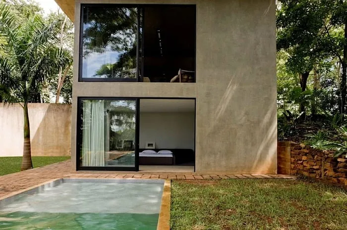 Bedroom leading to the backyard facing pool