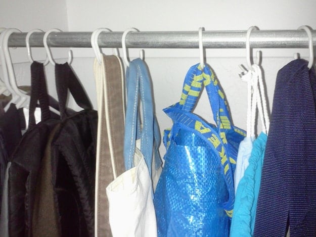 Hang bags with shower curtain hooks - 19 Easy Decluttering Tips to Improve Feng Shui and Your Life