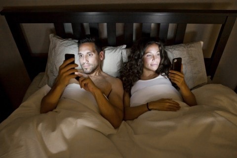 Smartphone in bed affects love min - 27 Feng Shui Tips to Attract Love and Improve Romance